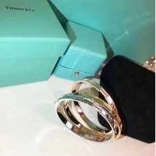 Tiffany Atlas Ladies Closed Hinged Silver Pink/ Yellow Gold Bangle Crystals